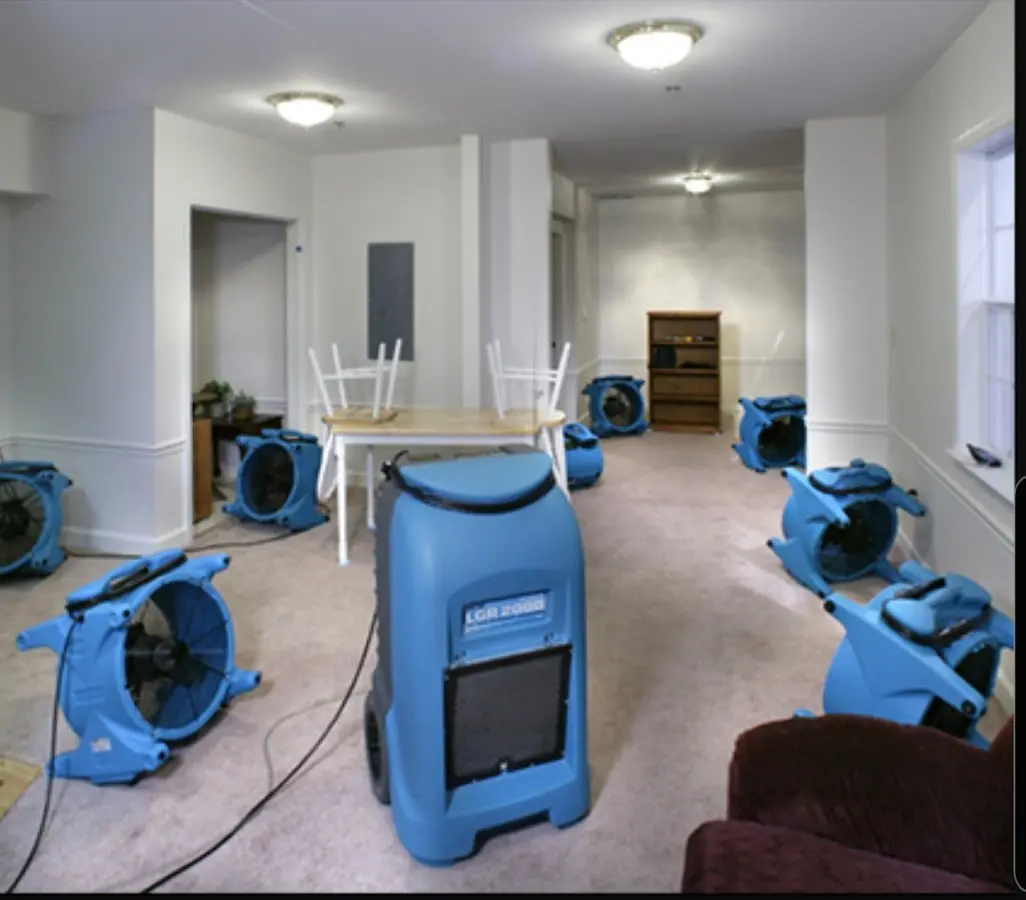 Air movers and dehumidifier setup for Water Damage Restoration in Elfers
